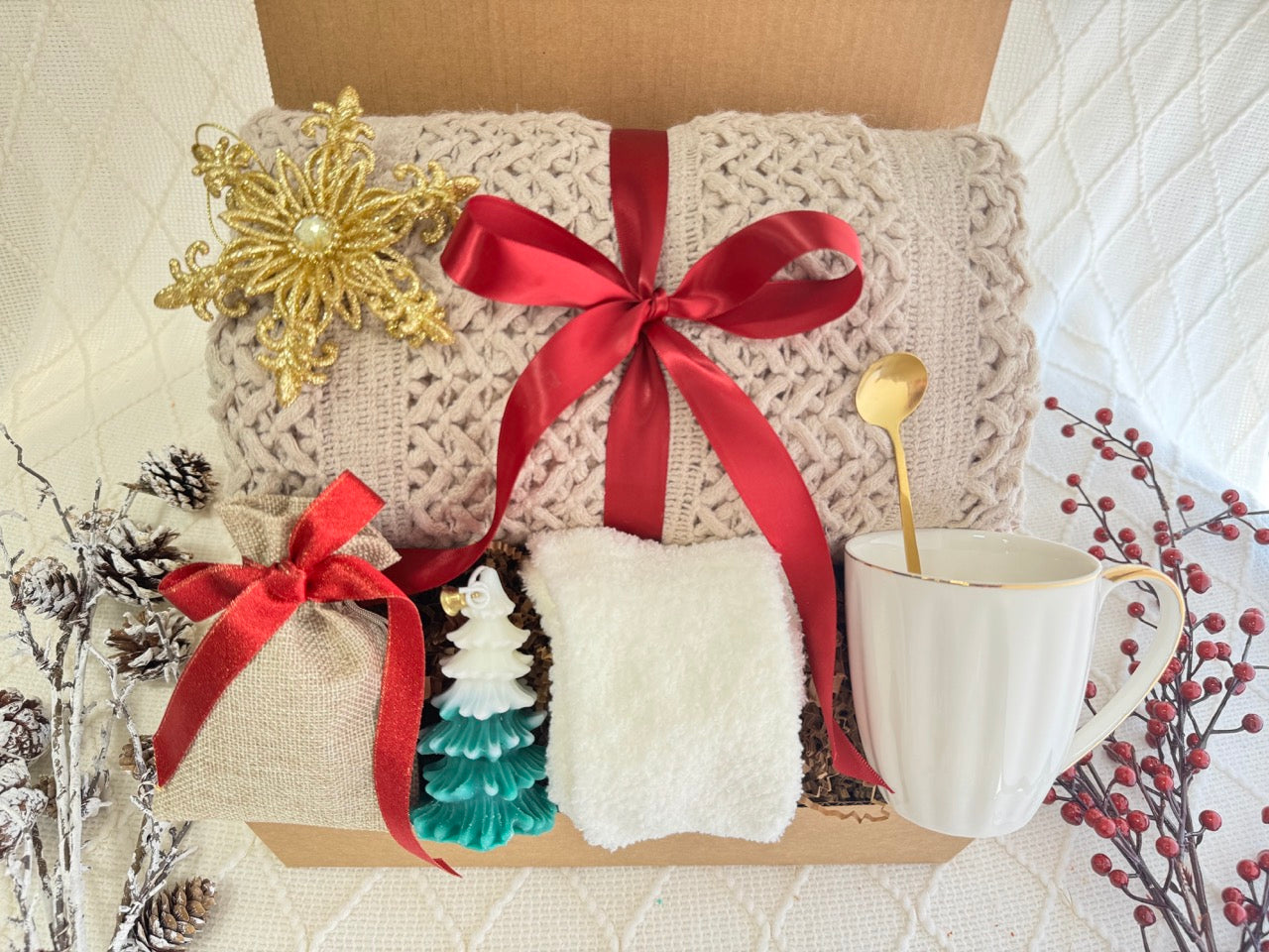 I Have a Dream Gift Box featuring a throw blanket, white fluffy socks, coffee mug, Christmas tree candle, snowflake Christmas ornament, golden coffee spoon, hot chocolate, and burlap bag.