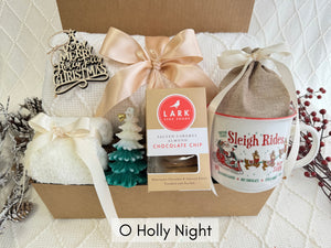 Discover the O Holy Night Gift Box, a curated selection of cozy essentials, festive treats, and elegant accents for a magical holiday season.